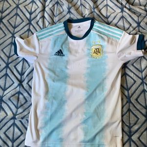 This a Argentina kids large jersey , blue and white
